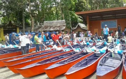 <p>FIBERGLASS BOATS. Marawi fishermen receive on Tuesday some PHP2-million worth of fishing inputs, including new fishing boats, from BFAR-ARMM after the city was identified as one of the best performing LGUs in the field of fisheries and aquatic resources management. (Photo by BFAR-ARMM)</p>